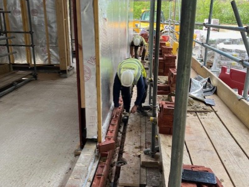 First layers of outer-skin brickwork being laid 13.04.26
